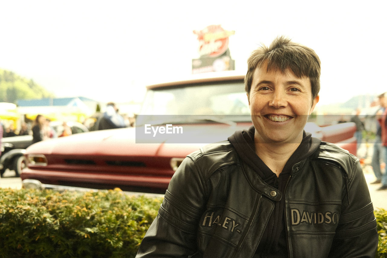 Woman in harley davidson leather jacket