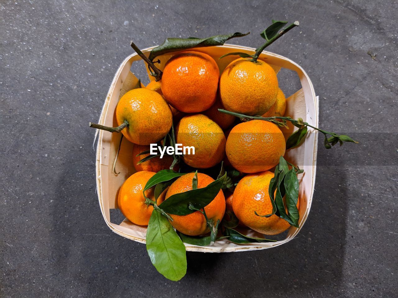 High angle view of orange fruits in bowl