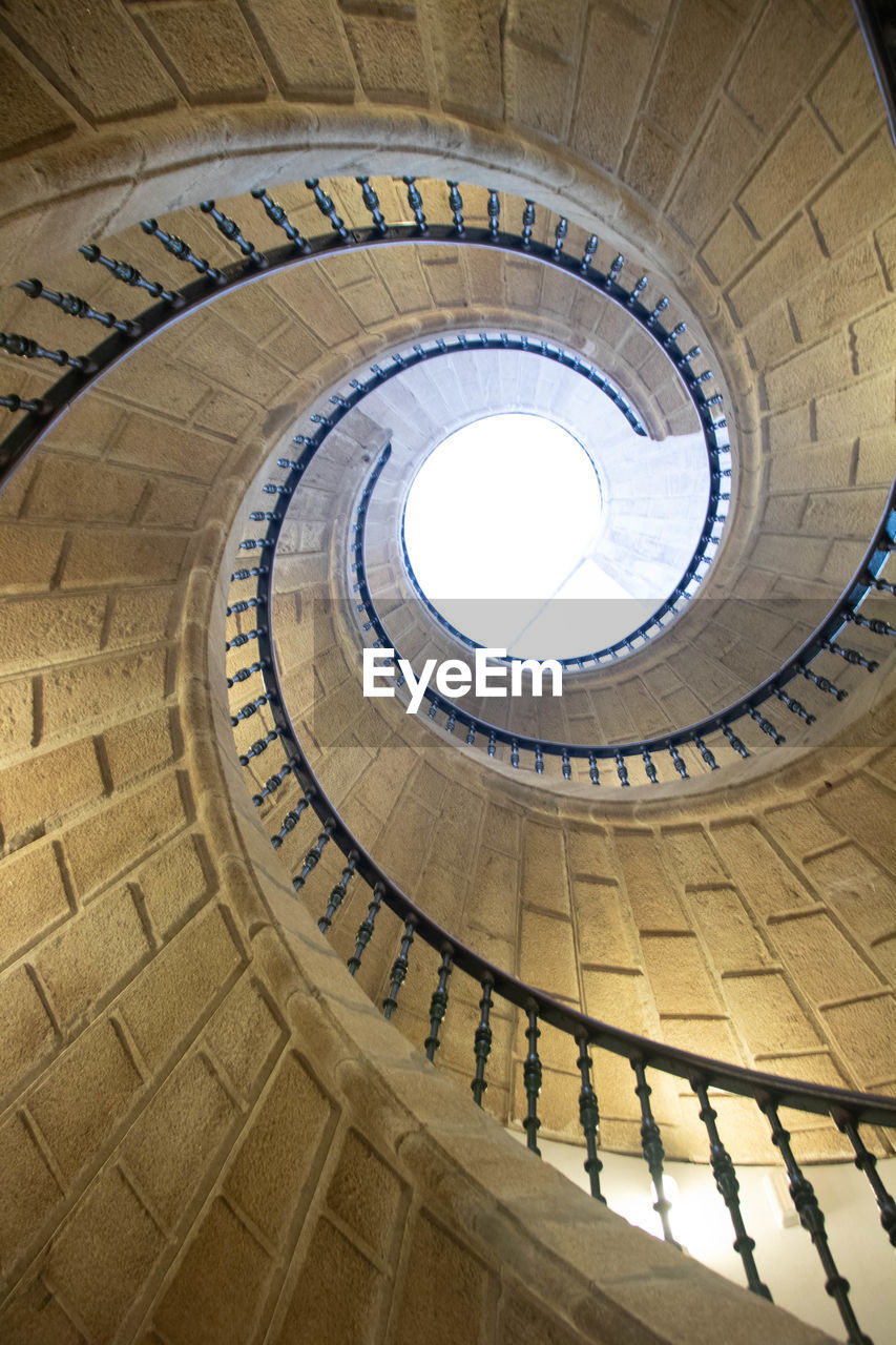 low angle view of spiral staircase in building
