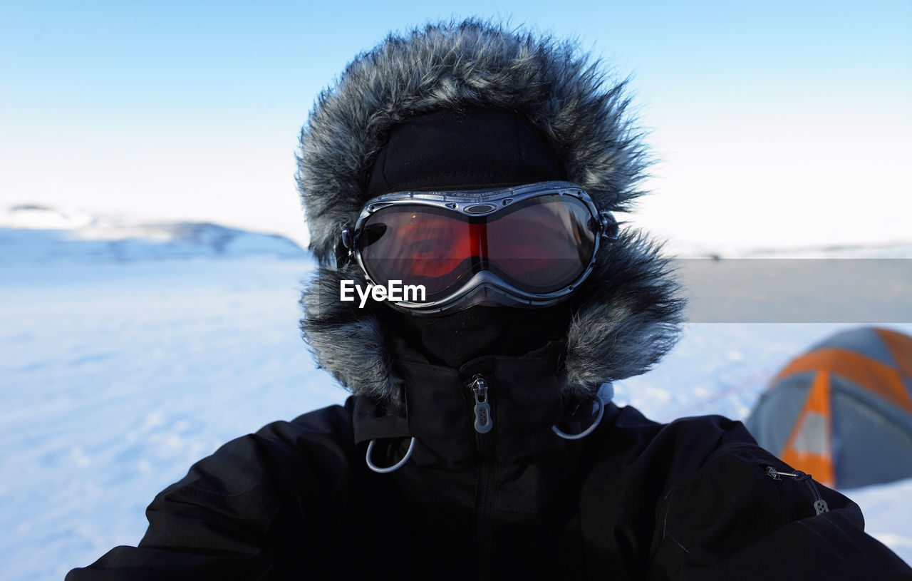 Portrait of mature man at camp on icelandic glacier