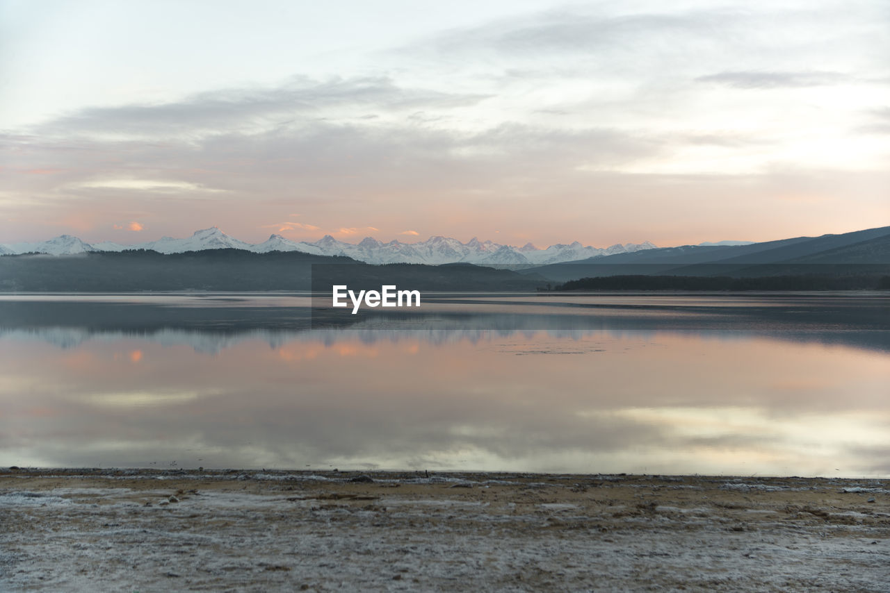 Scenic view of sea against sky during sunset