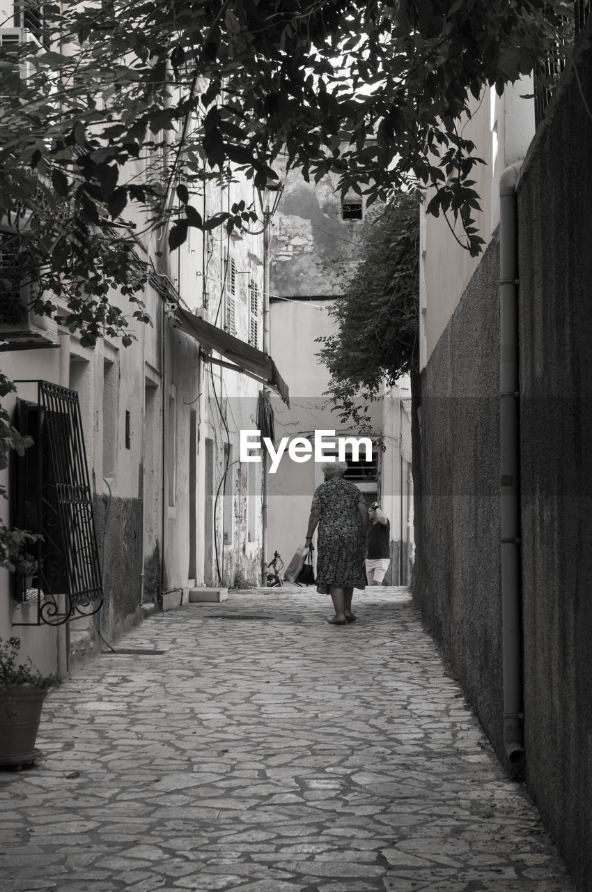 ALLEY AMIDST BUILDINGS