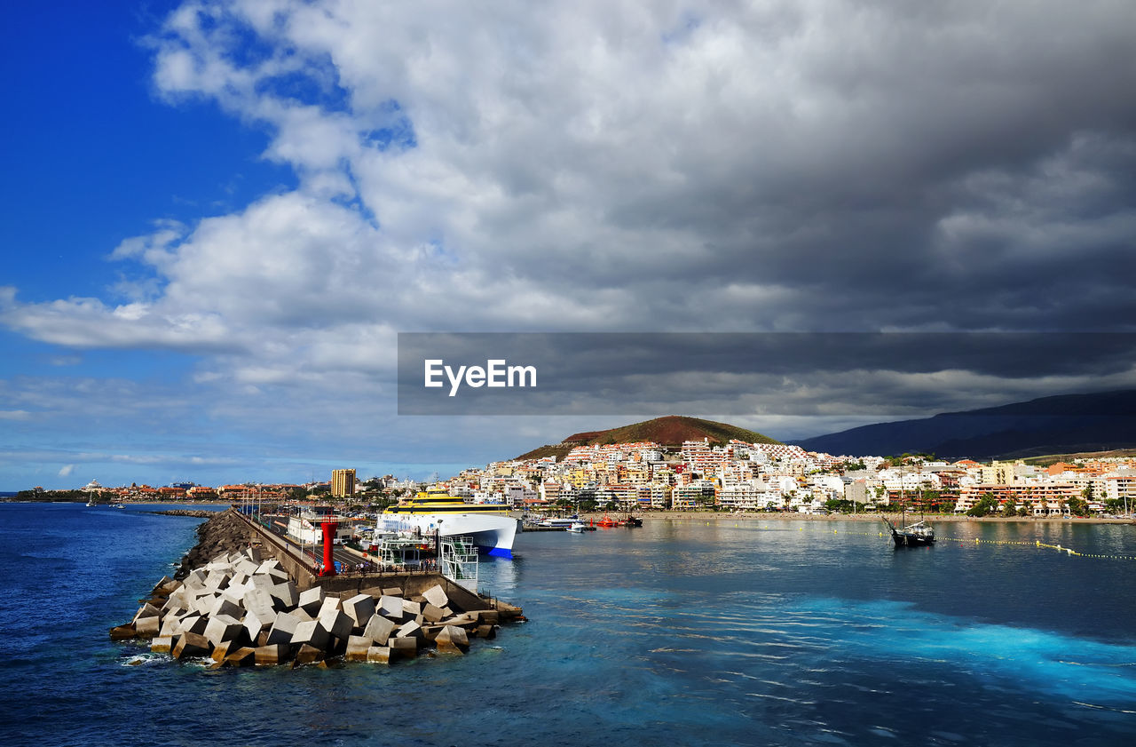 Scenic view of sea against cloudy sky