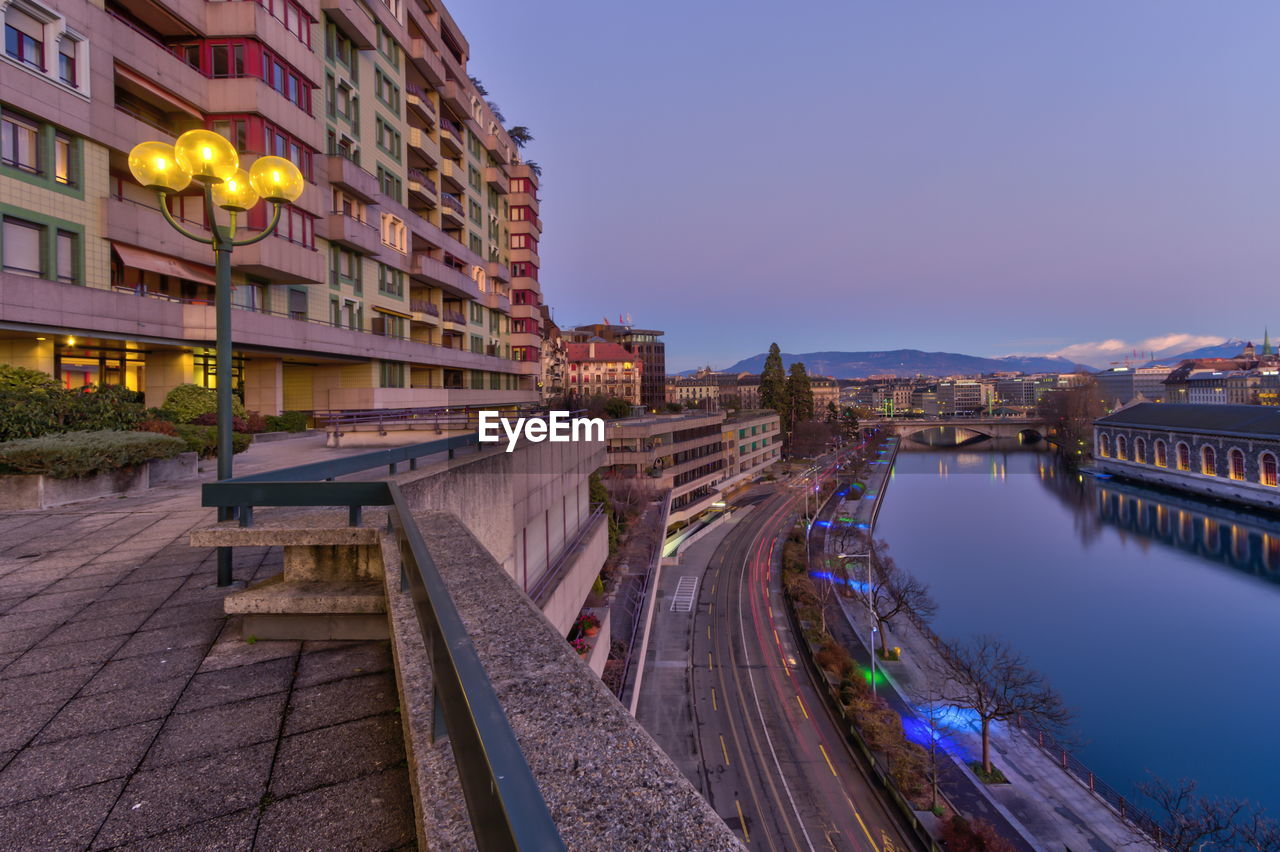 Park and old buildings by sunset, geneva, switzerland - hdr