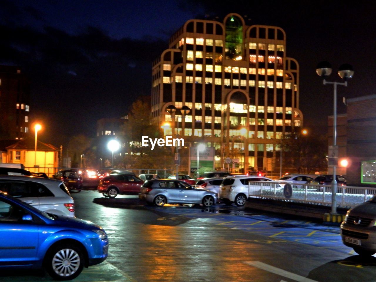 VIEW OF TRAFFIC ON ROAD AT NIGHT