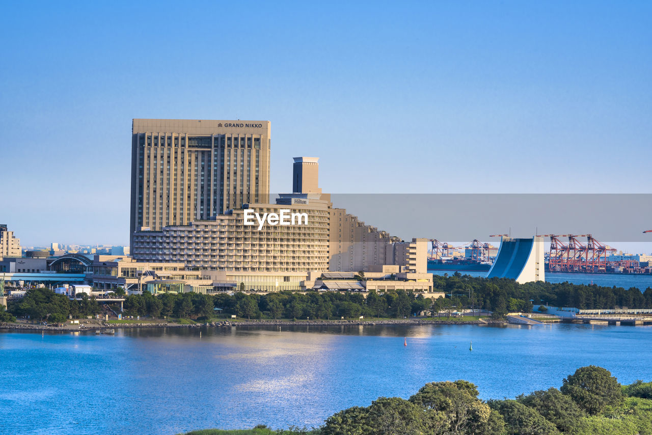 View of the bay of odaiba with daiba park, mall and hotels.