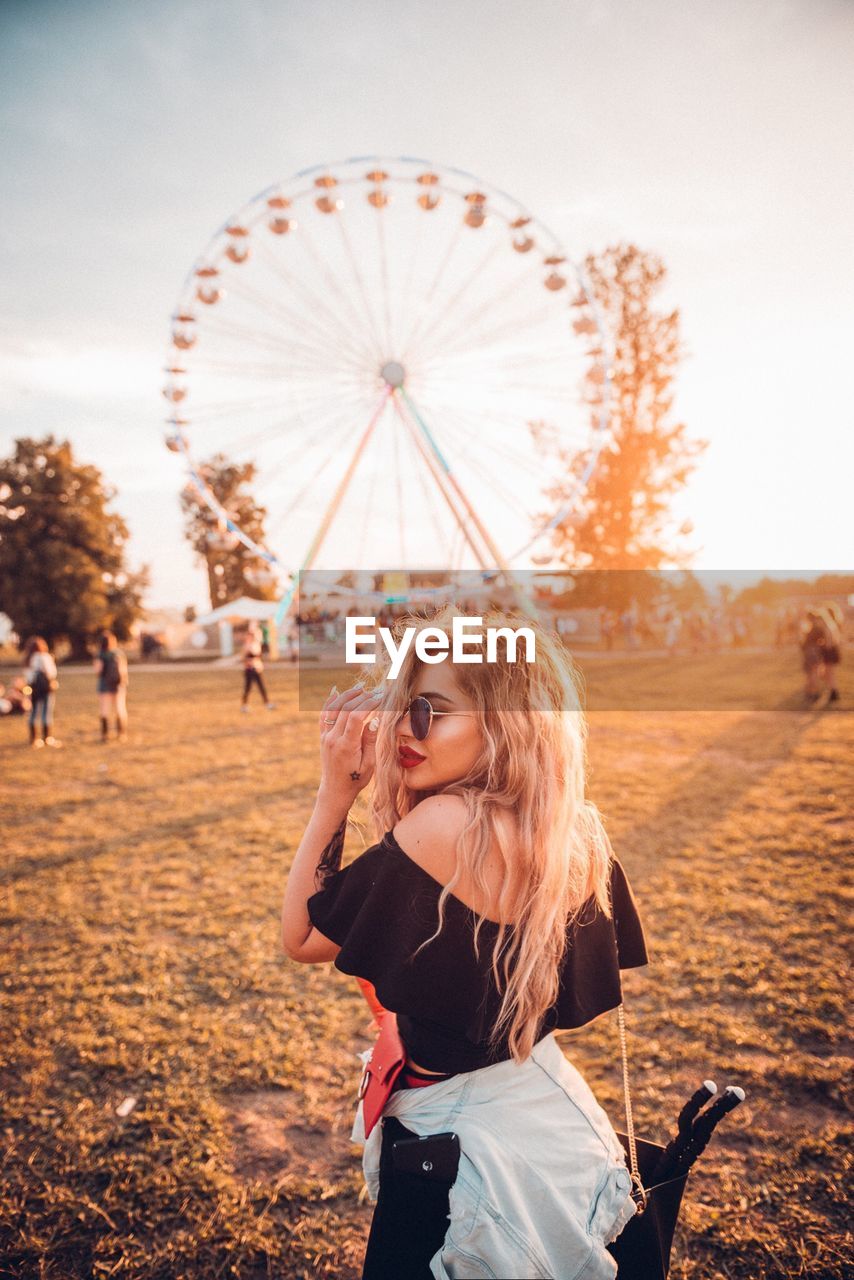 Young woman at amusement park