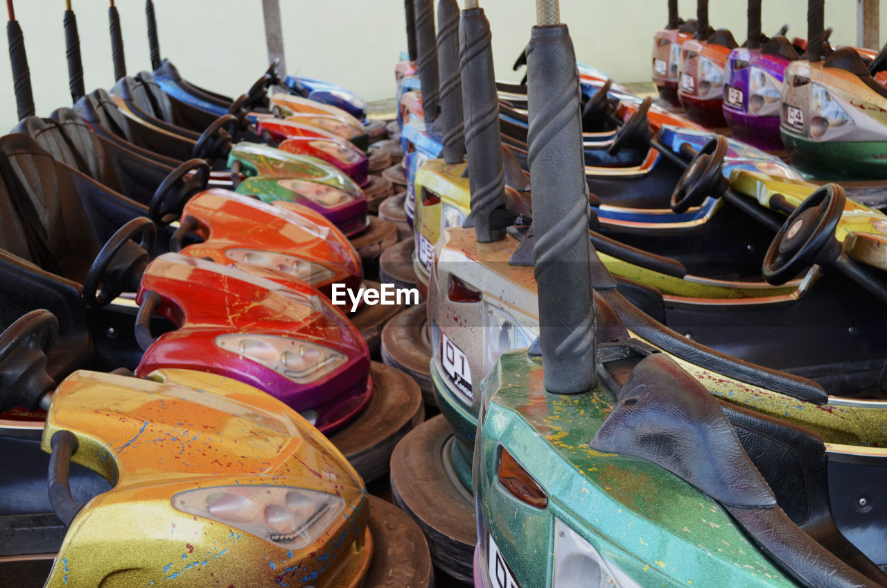 Colorful bumper cars at amusement park