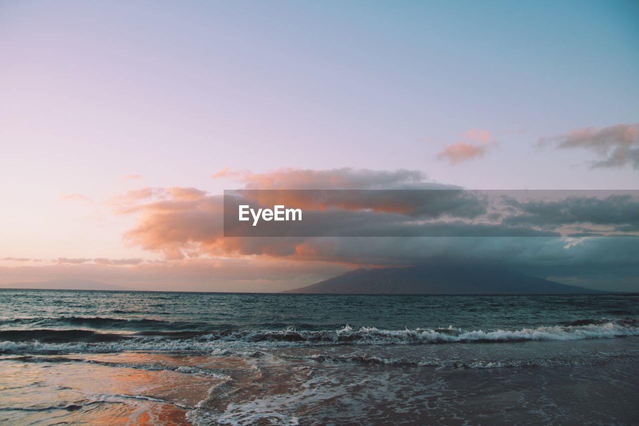 Scenic view of sea against sky during sunset