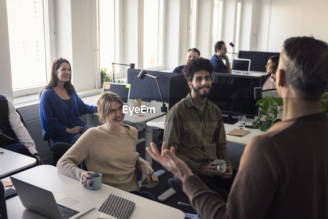 Group of business people having meeting in office