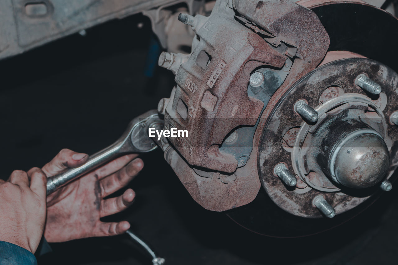 hand, one person, adult, holding, metal, occupation, mode of transportation, close-up, men, indoors, transportation