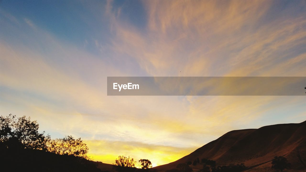 LOW ANGLE VIEW OF SKY AT SUNSET