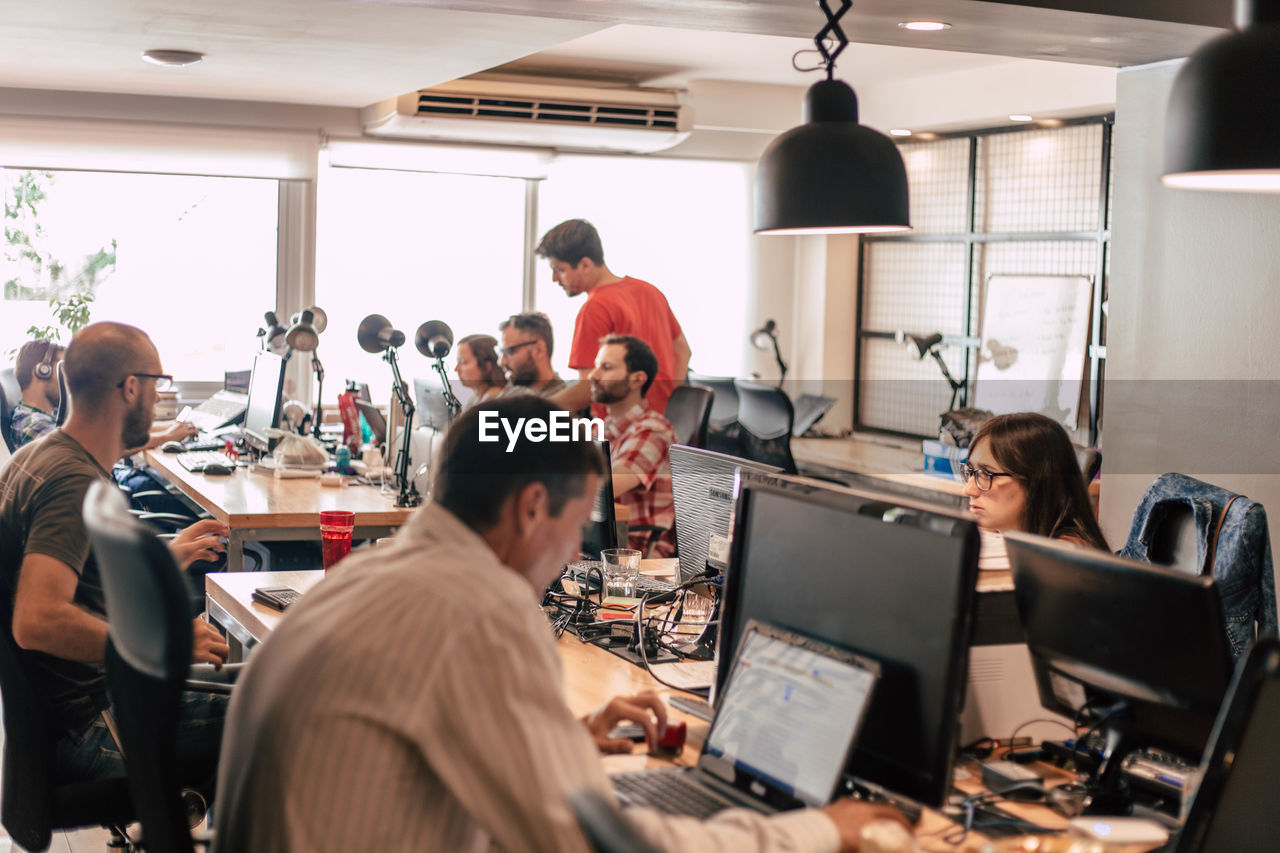 Business colleagues working at office