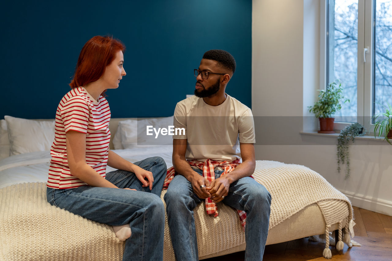 couple sitting on sofa