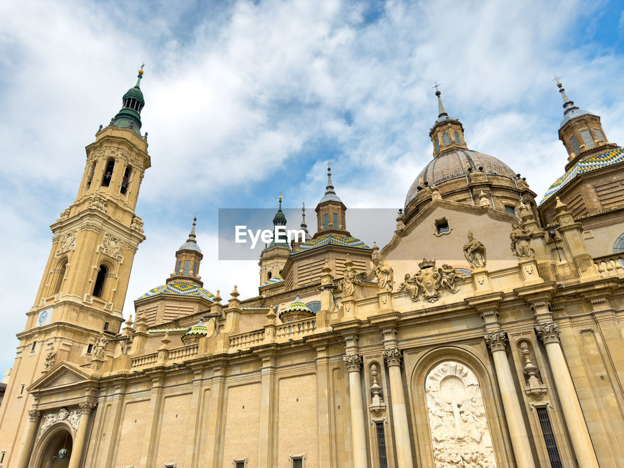 architecture, building exterior, built structure, travel destinations, sky, worship, religion, place of worship, landmark, travel, city, belief, cloud, building, history, low angle view, the past, nature, spirituality, tourism, dome, tower, facade, no people, day, catholicism, outdoors, blue