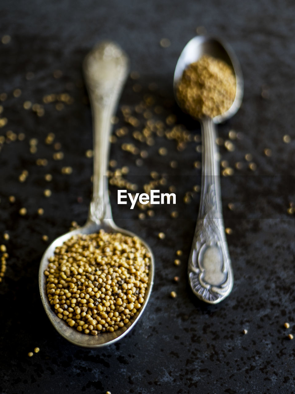 Close-up of mustard seeds in spoon