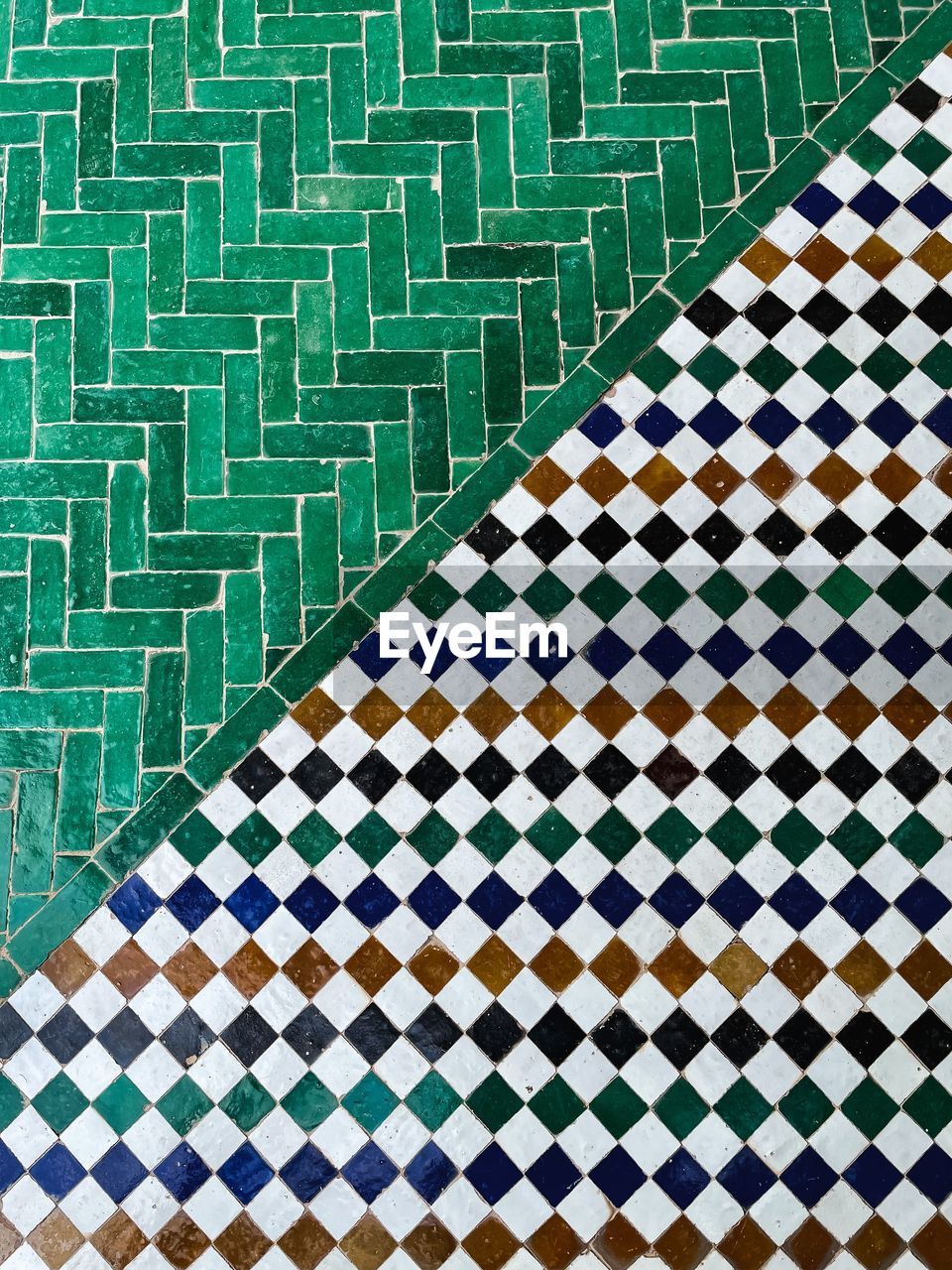 Full frame shot of green and white mosaic flooring
