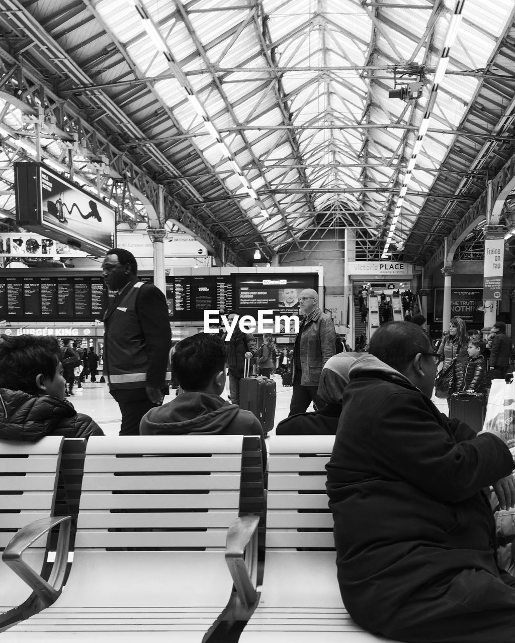 PEOPLE SITTING IN TRAIN