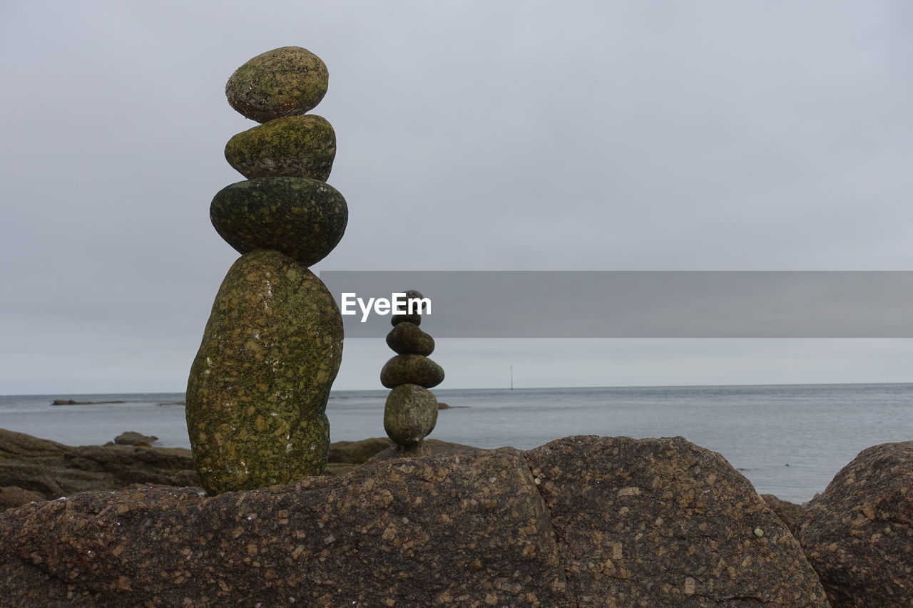 STACK OF STONES ON SHORE