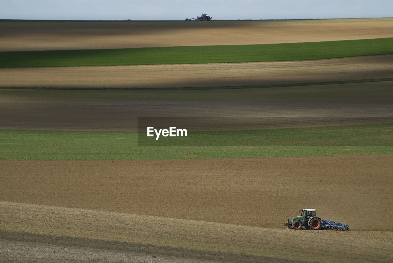 High angle view of tractor on farm during sunny day