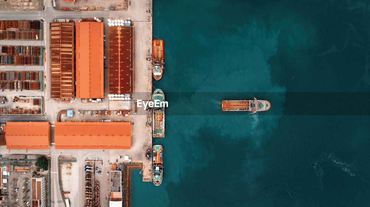 Aerial view of commercial dock by sea