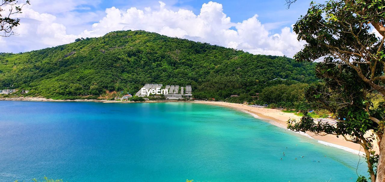 Scenic view of swimming pool by sea against sky