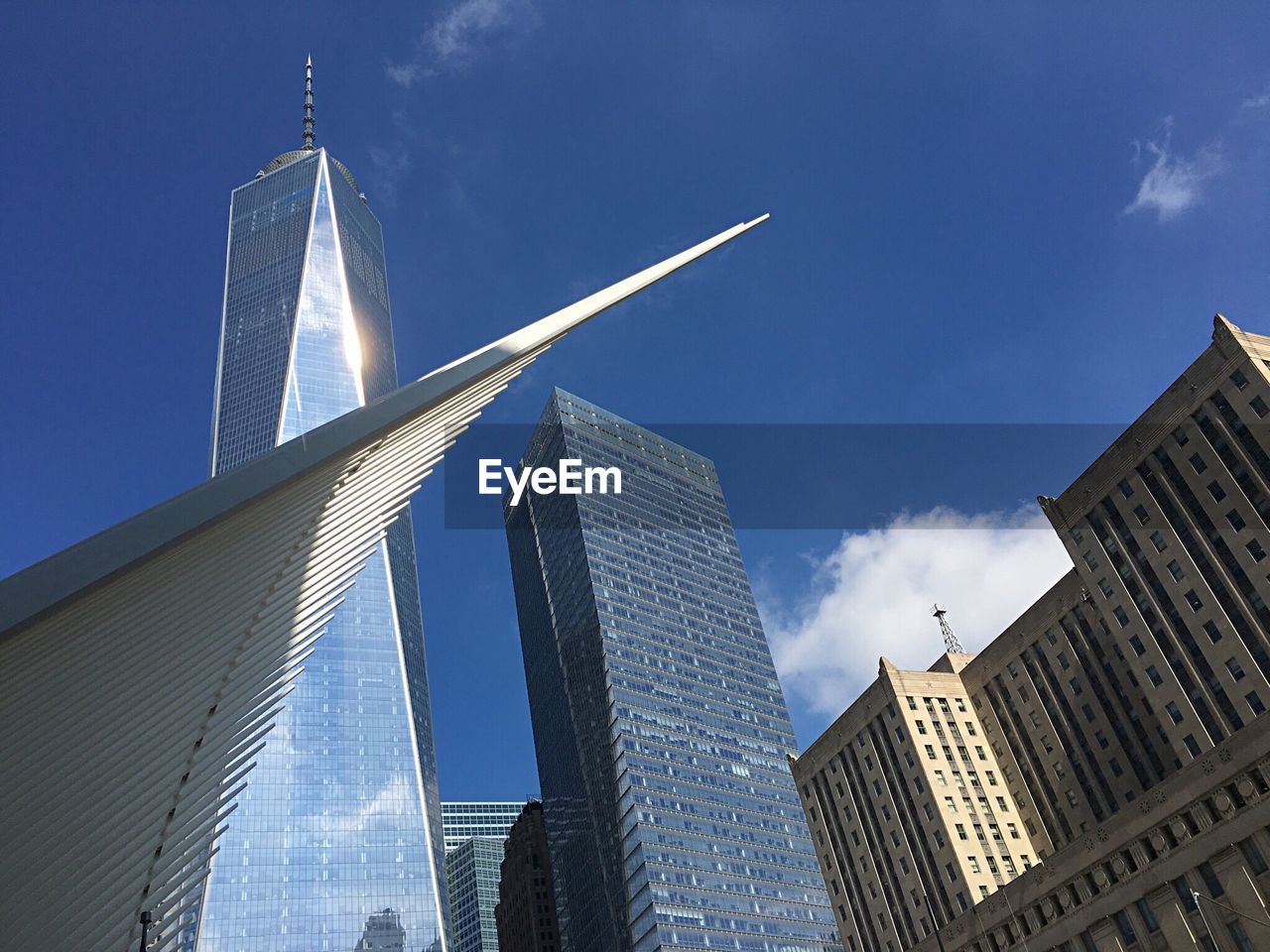 Low angle view of skyscrapers against sky