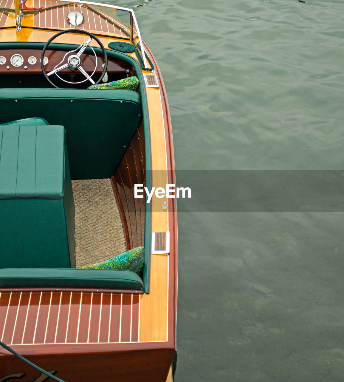 High angle view of vintage boat moored in lake