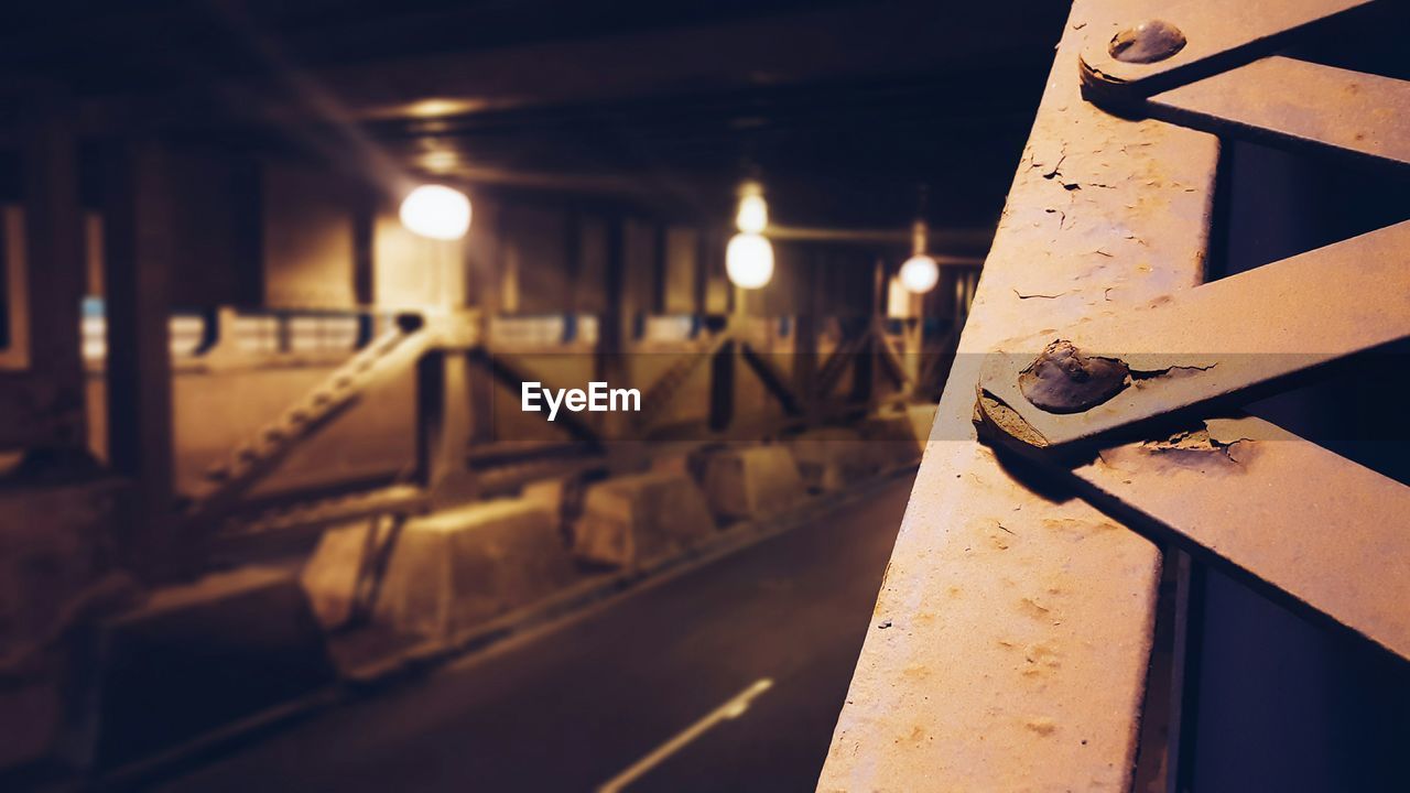 Illuminated bridge at night