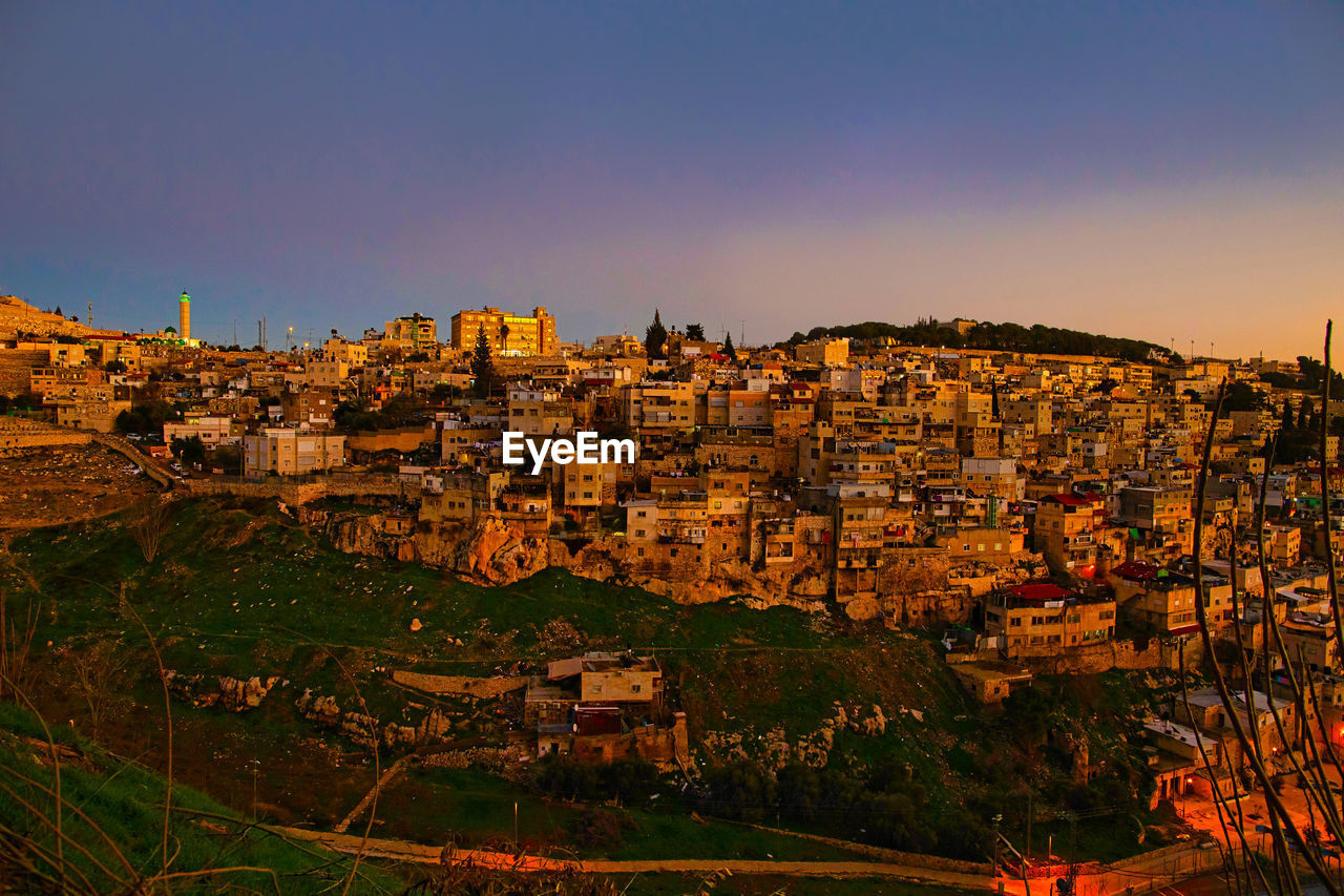  old city. east quarter. muslim quarter, panoramic top view at blue hour at sunset.