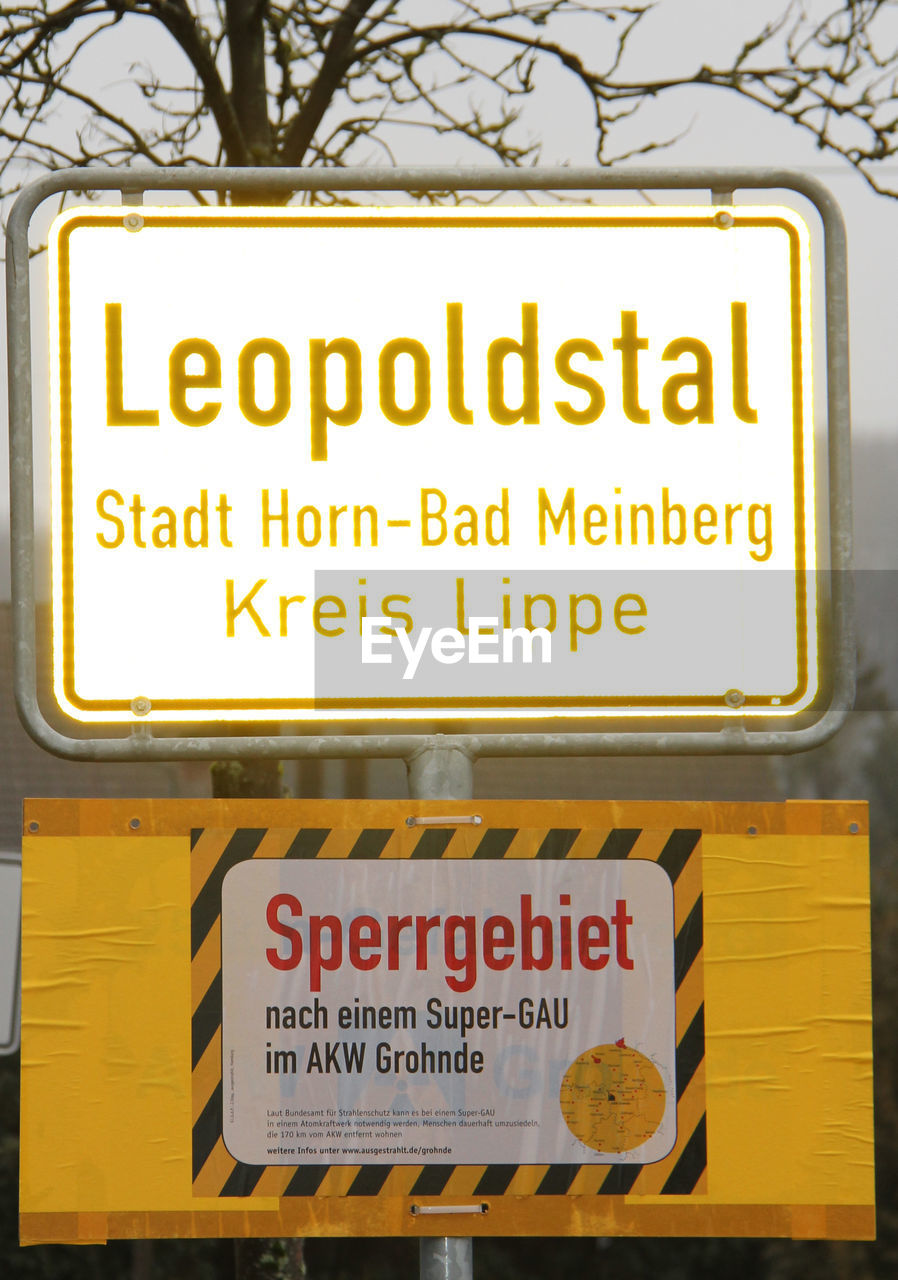 CLOSE-UP OF WARNING SIGN