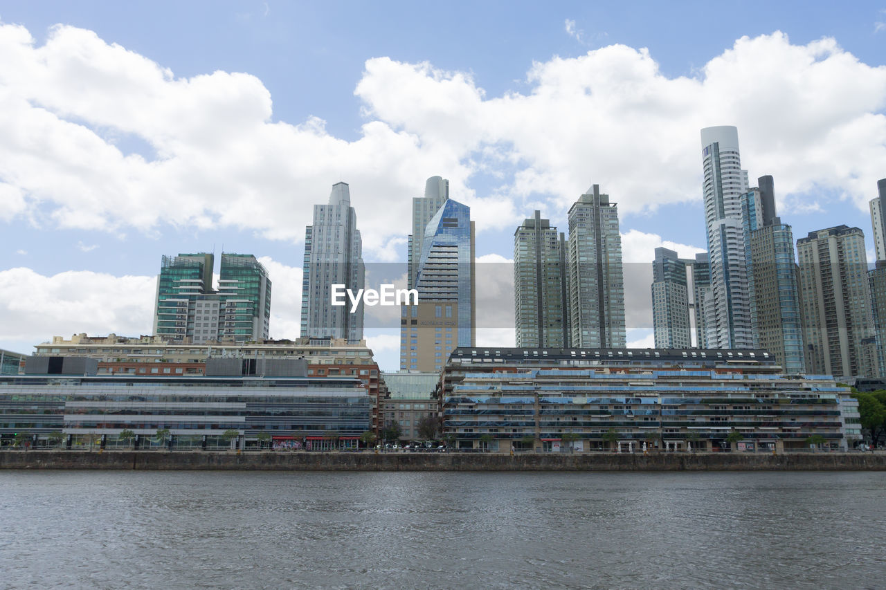 MODERN BUILDINGS AGAINST SKY IN CITY