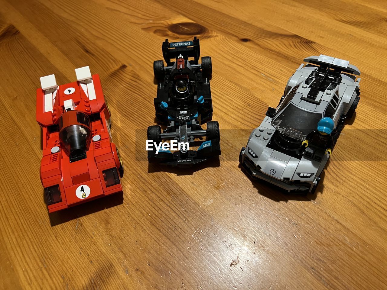 toy, high angle view, vehicle, transportation, car, mode of transportation, wood, lego, motor vehicle, toy car, technology, land vehicle, no people, indoors
