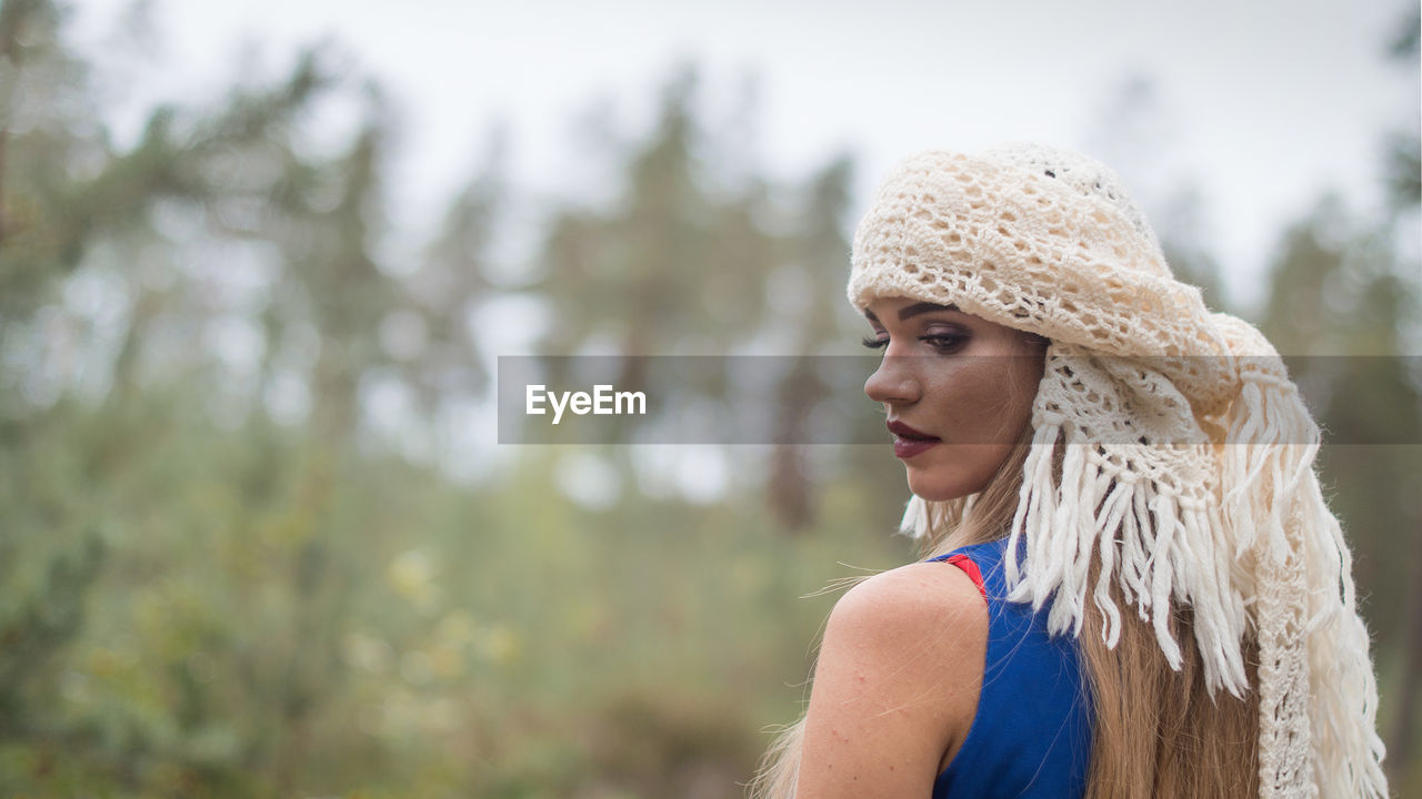 Rear view of woman wearing headscarf outdoors