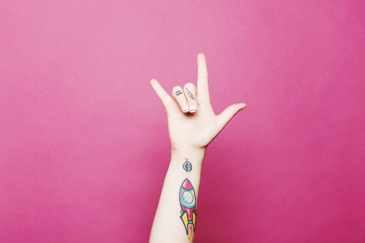 pink, hand, finger, one person, studio shot, indoors, arm, pink background, colored background, tattoo, adult, close-up, arts culture and entertainment, creativity, limb, purple, women, human limb