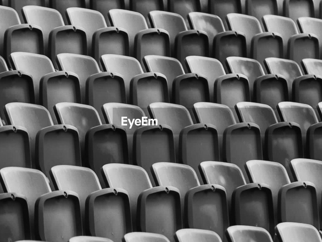 full frame shot of empty seats in stadium