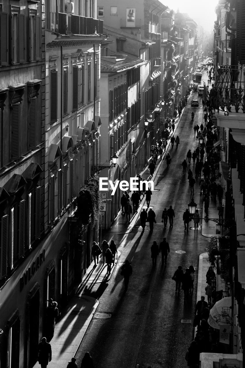 High angle view of people on street in city