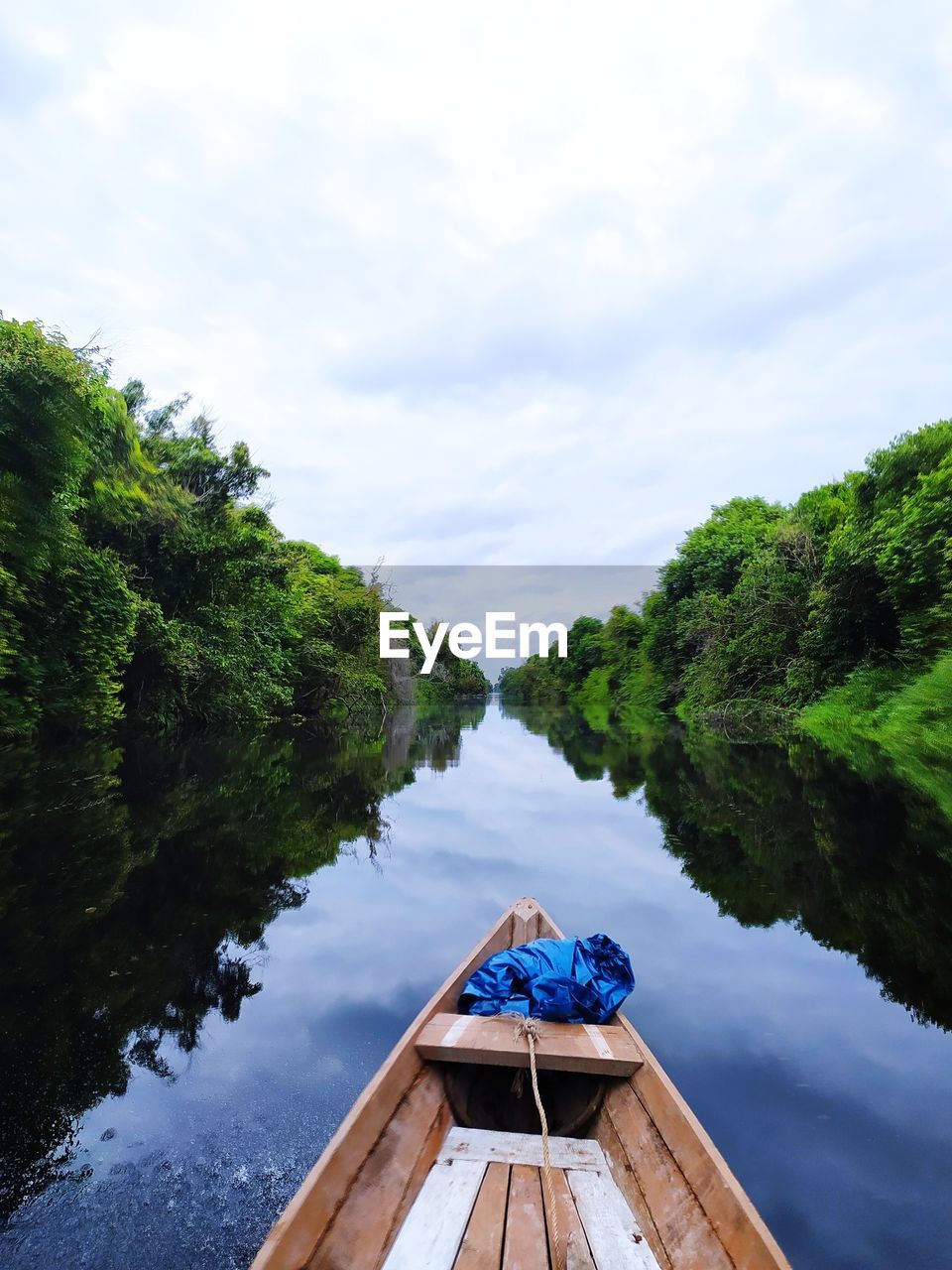 Scenic view of river and sky from boat