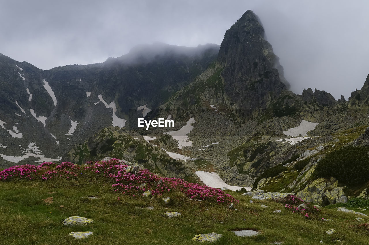 Scenic view of mountains against sky