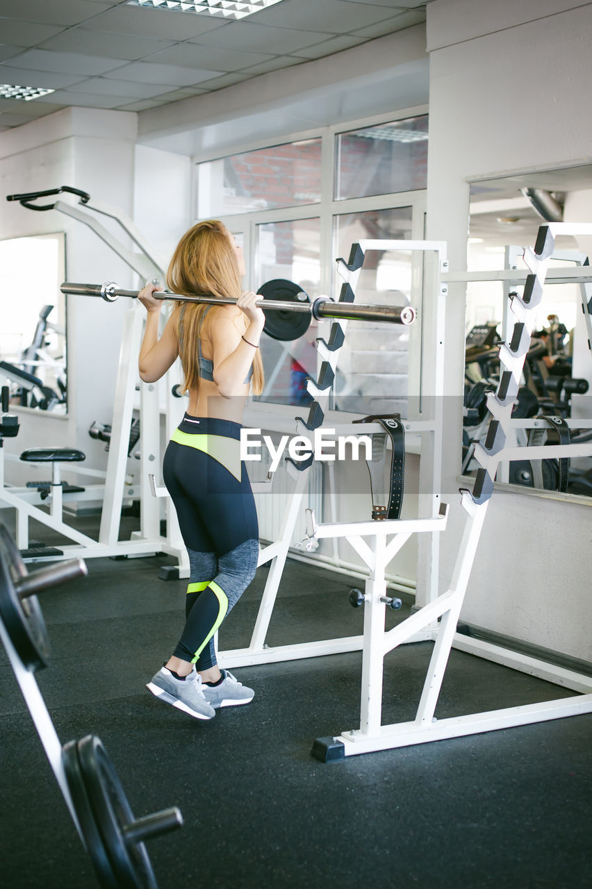 Woman exercising in gym