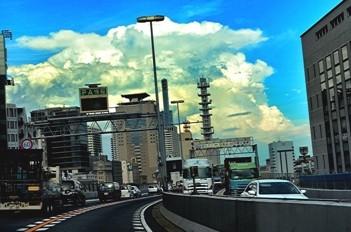 VIEW OF CITY STREET AND BUILDINGS