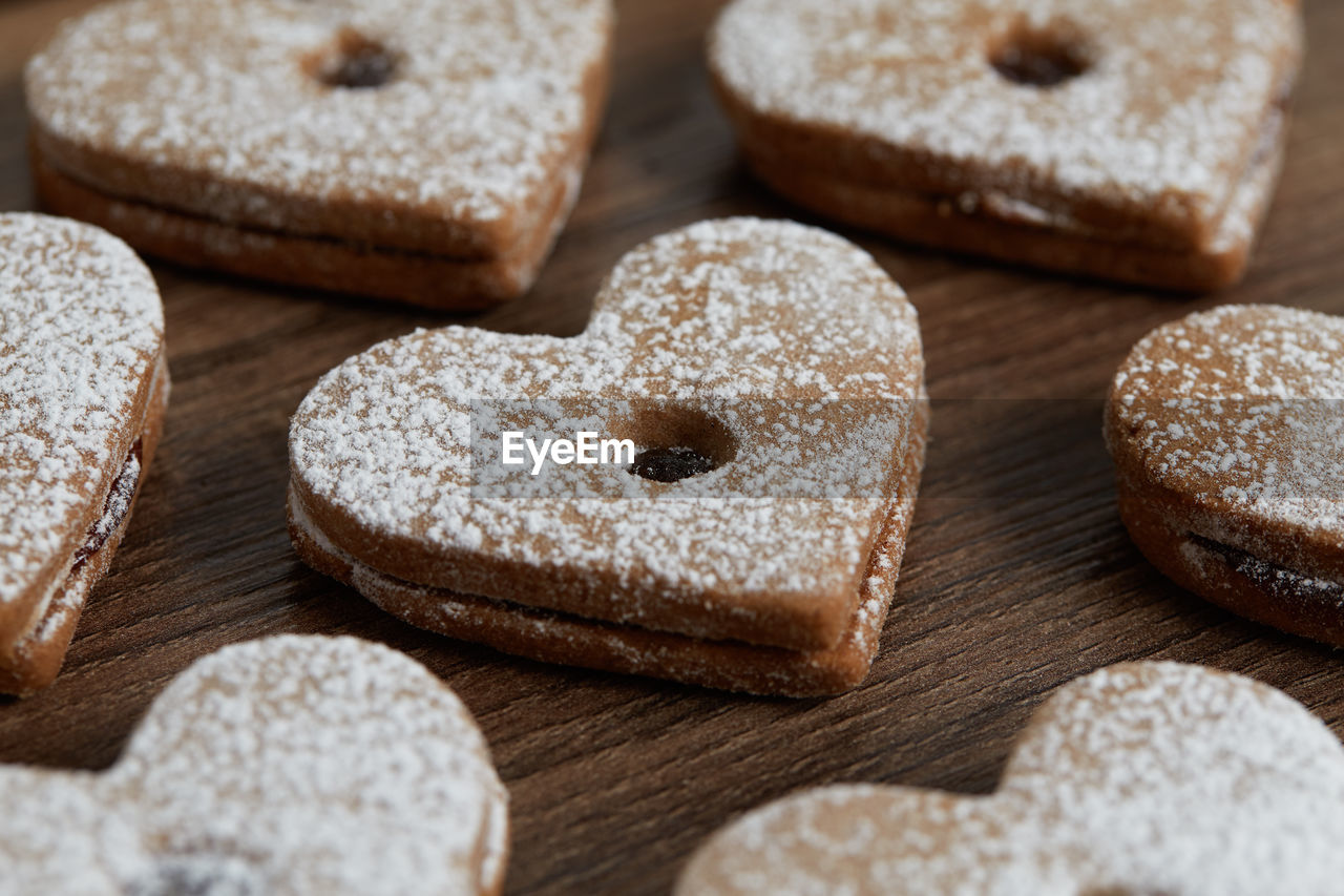 Close up of freshly baked homemade christmas sugar cookies with jam