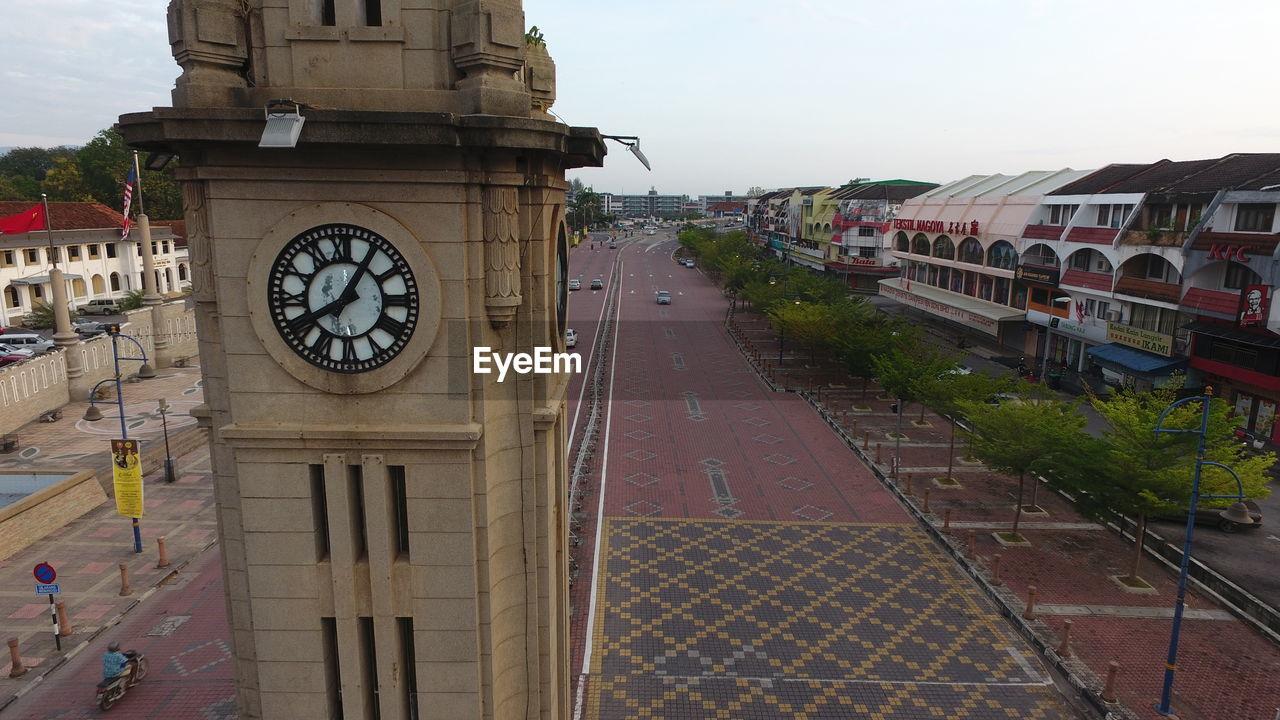 HIGH ANGLE VIEW OF CLOCK ON WALL