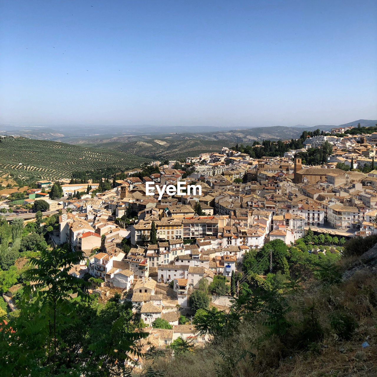 High angle shot of townscape against clear sky