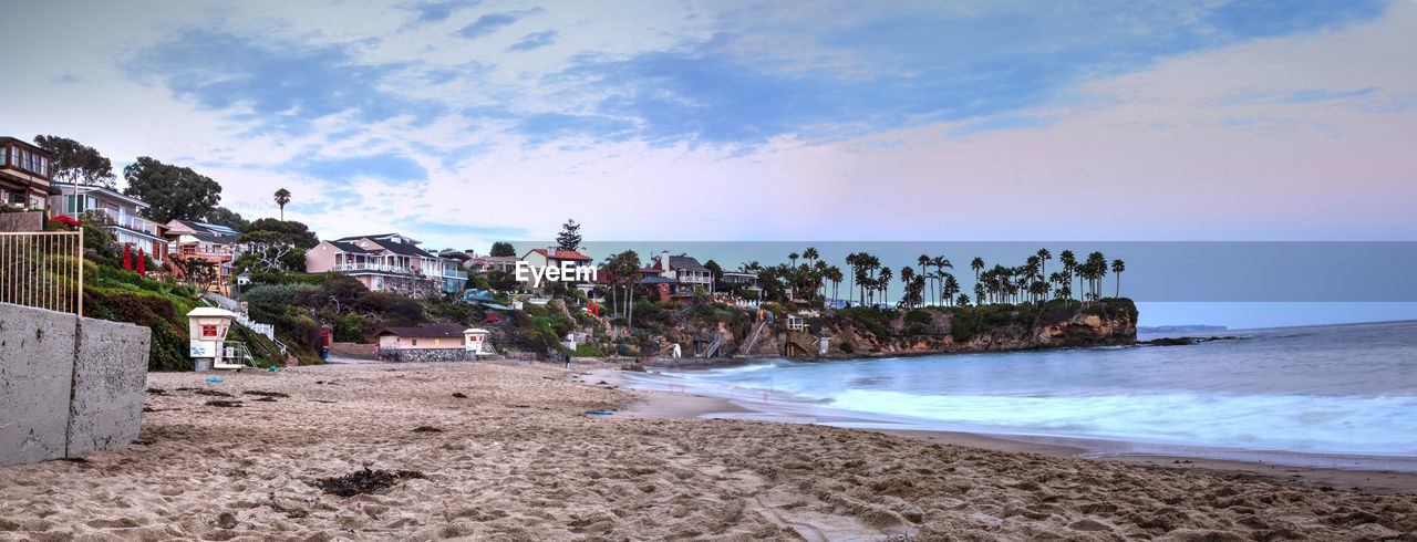 Scenic view of beach against sky