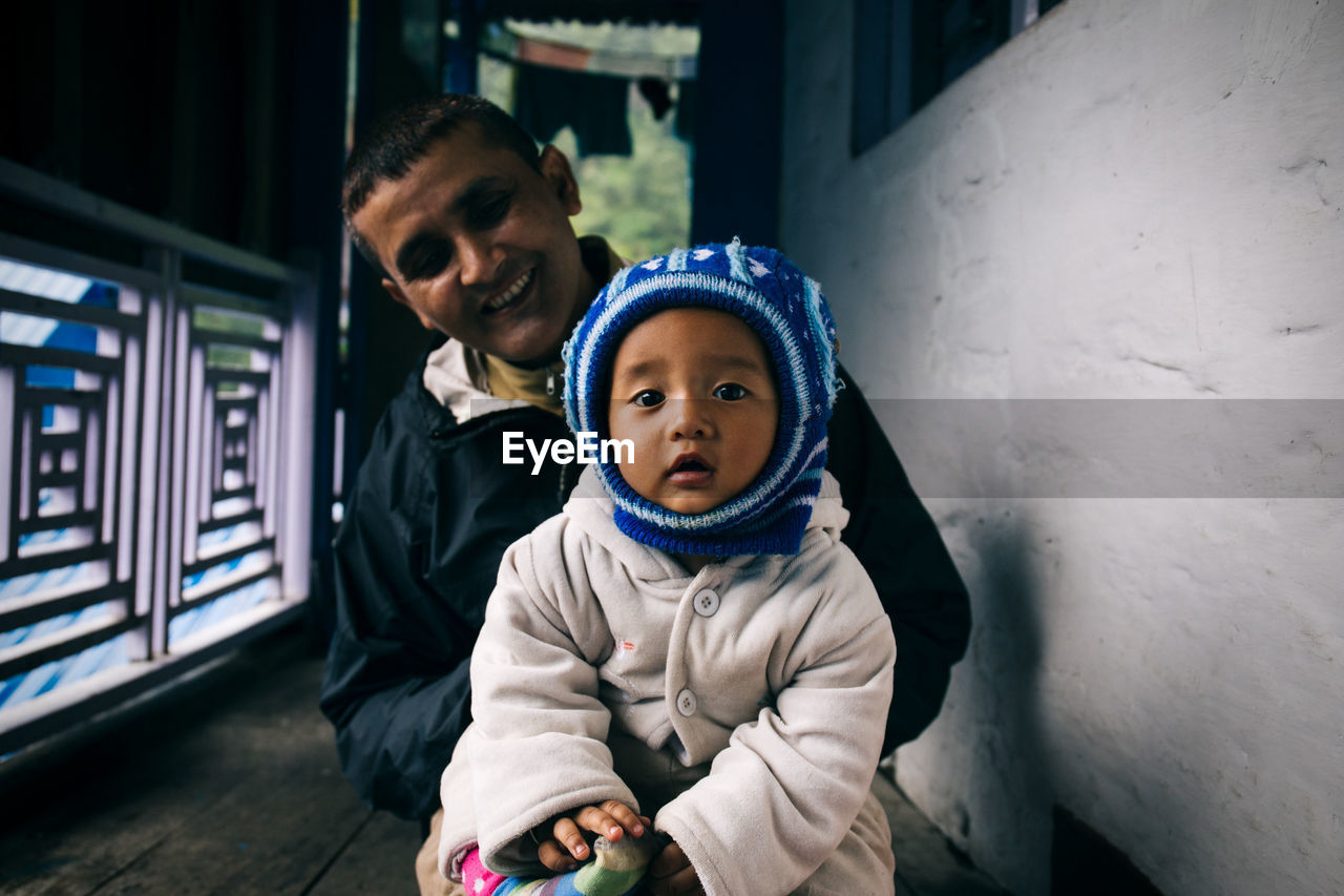 PORTRAIT OF FATHER AND SON