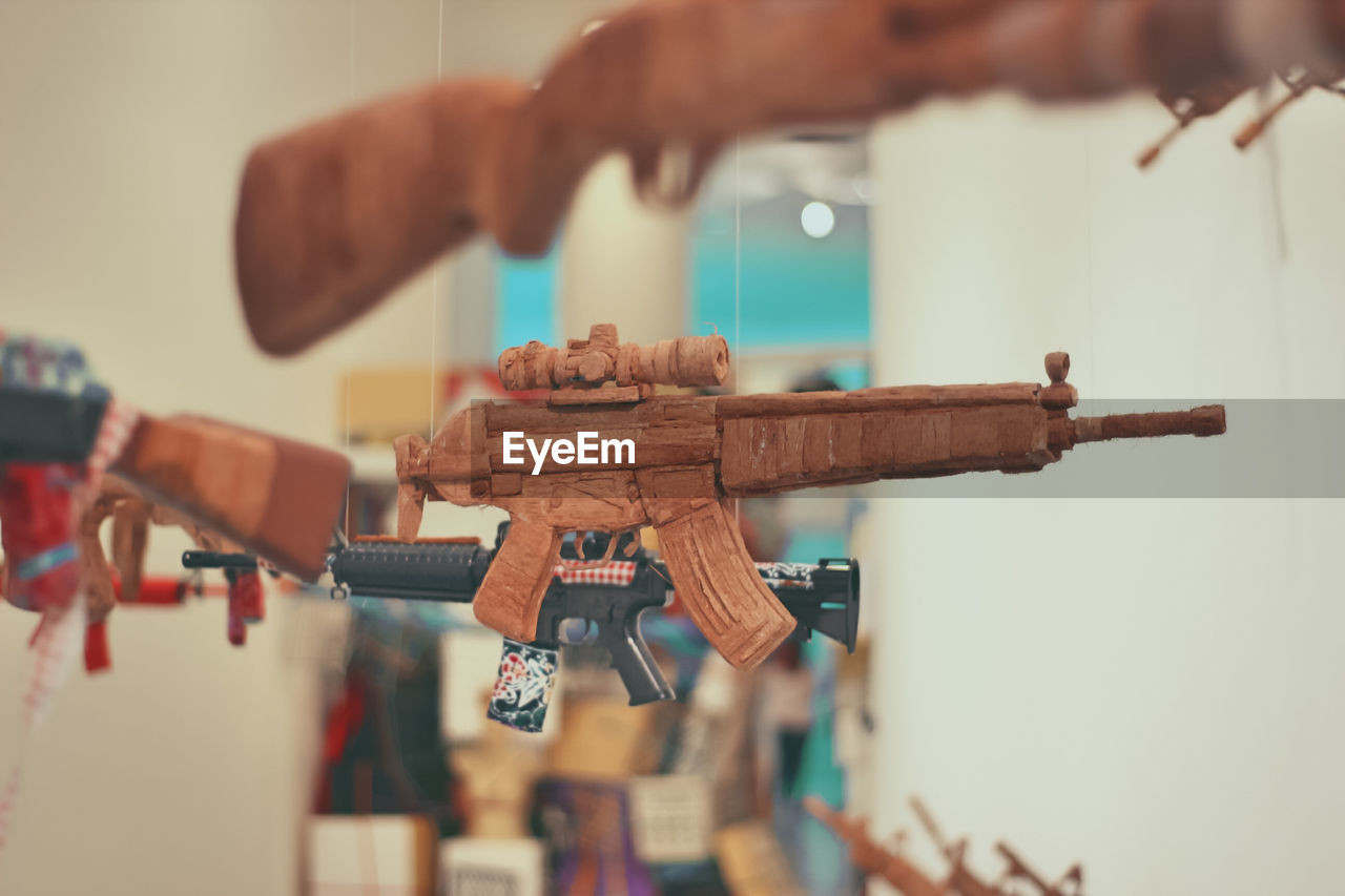 Close-up of guns for sale