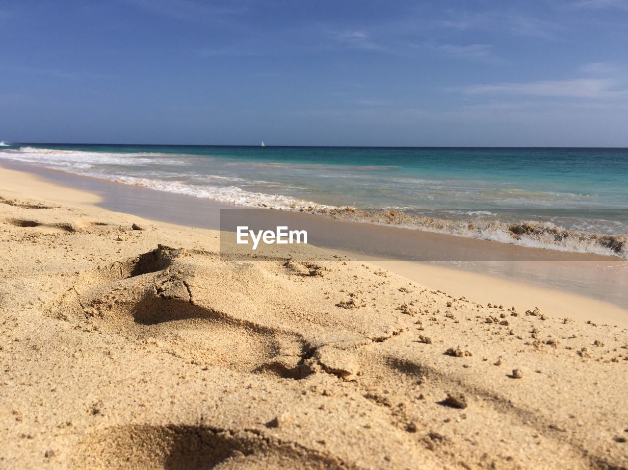 Scenic view of beach against sky