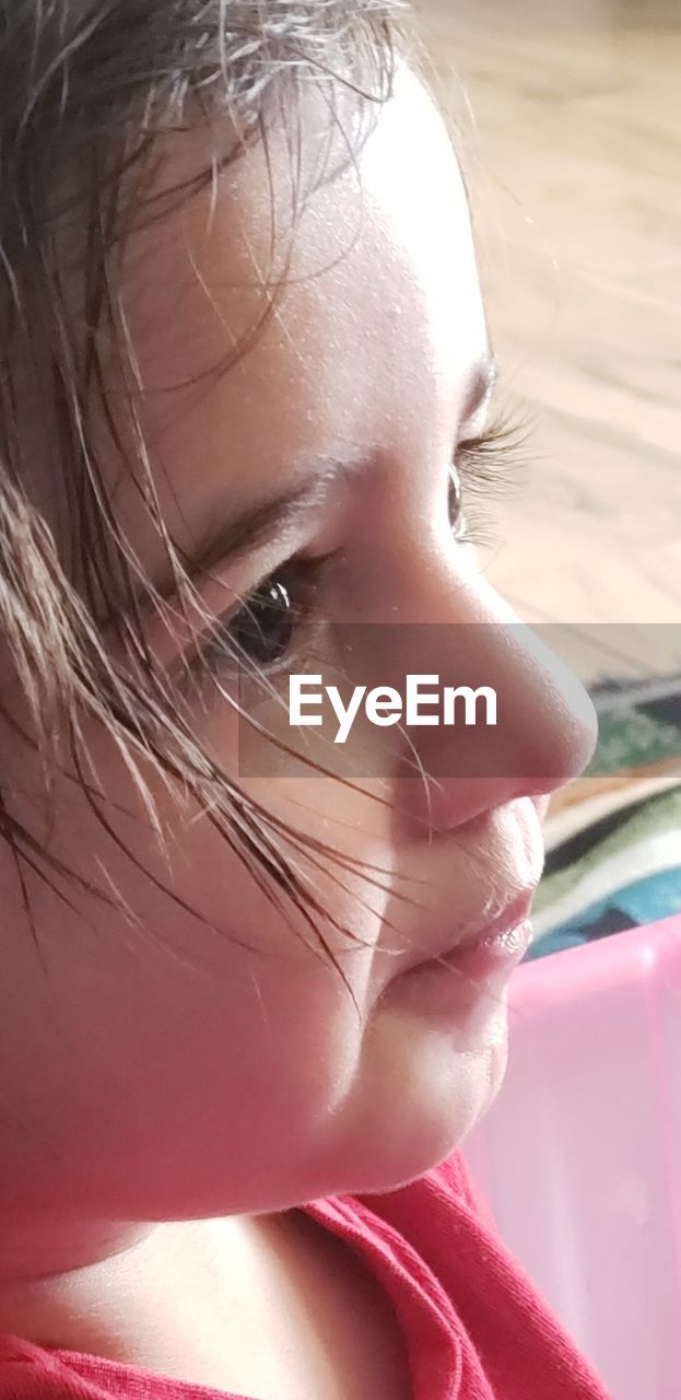 CLOSE-UP PORTRAIT OF A GIRL