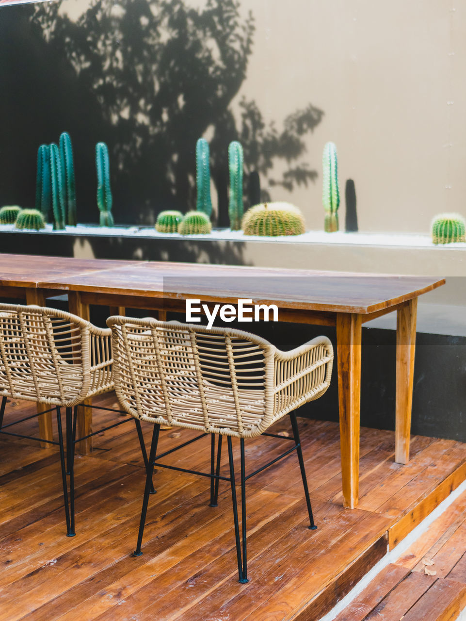 Empty chairs and tables in restaurant